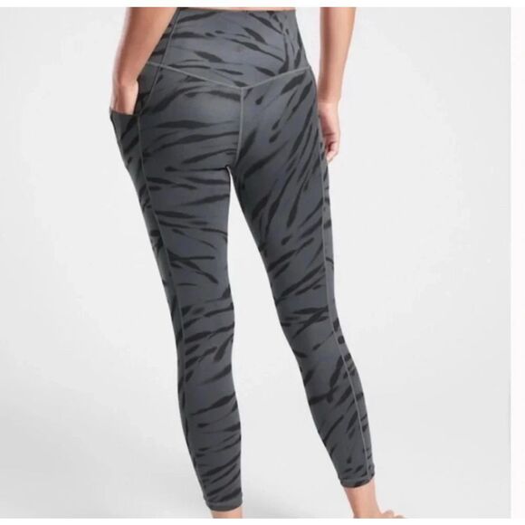 Athleta M salutations stash pocket II zebra stripe tight 7/8 leggings - Picture 2 of 5
